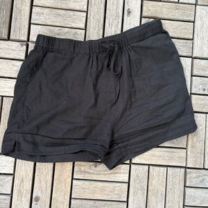 Black linen Princess Polly shorts.